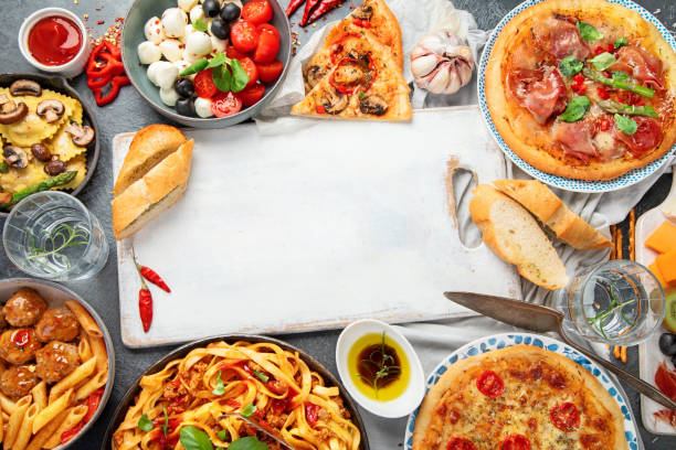 istock Italian food assortment on dark background. 1402989657