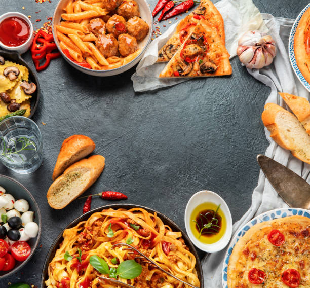 istock Italian food assortment on dark background. 1402989746