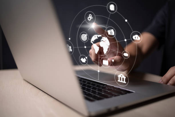istock Businessman using laptop and virtual touch screen o do online transactions with internet technology, concept of global data connection by internet technology, big data, searching for marketing information 1402990624
