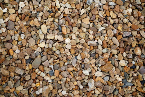 istock Close-up of river stone wall with textured 1402995865