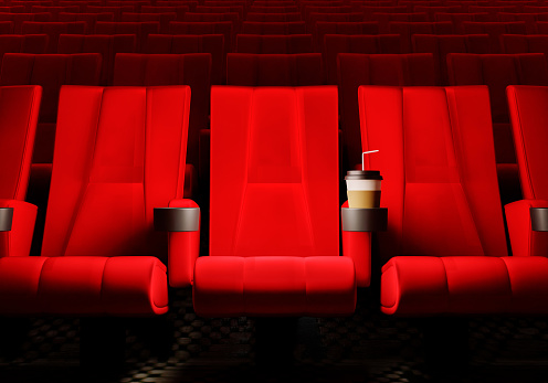 First row of empty cinema seats
