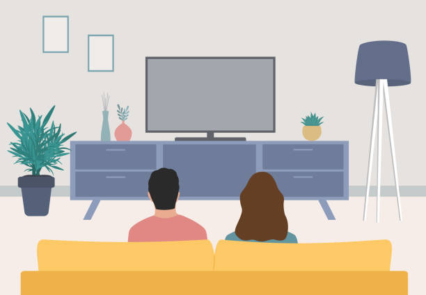 Rear View Of Young Couple Sitting On Sofa And Watching Television vector art illustration