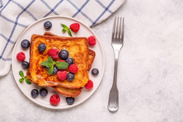 istock French toast with blueberries, raspberries, maple syrup 1403002192
