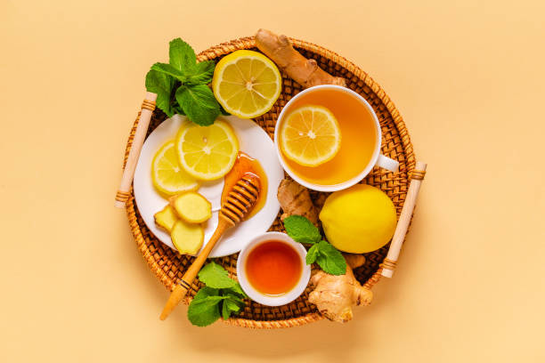 green tea with lemon, ginger and honey - ginger tea cup cold and flu tea imagens e fotografias de stock