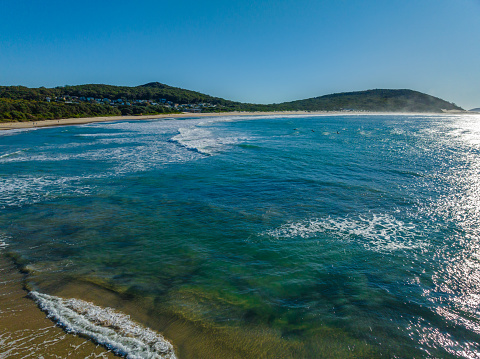 Aerial view of the beach and bay at Fingal Bay in Port Stephens, NSW, Australia