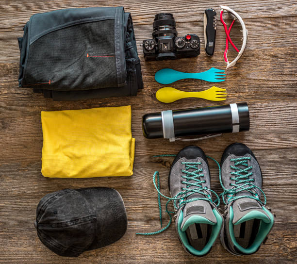 istock Hiking accessories on wooden background 1403009824