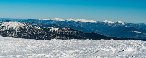 Krivanska Mala Fatra from Nizke Tatry mountains in Slovakia during winter morning Krivanska Mala Fatra mountains from hiking trail between Sedlo Durkovej and Chabenec hill in Nizke Tatry mountains in Slovakia during winter morning with clear sky durkova stock pictures, royalty-free photos & images
