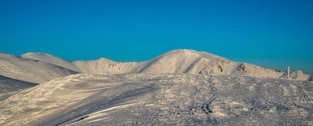 Winter Nizke Tatry mountains from Durkova hill Kotliska, Skalka and Ziarska hola from Durkova hill in Nizke Tatry mountains in Slovakia during amazing winter day with clear sky durkova stock pictures, royalty-free photos & images