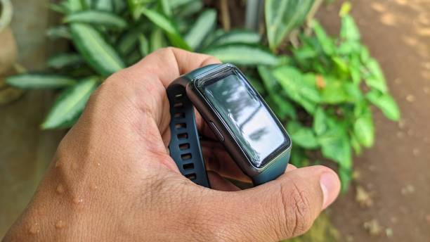 istock Hand holding smart band - smart watch 1403014277