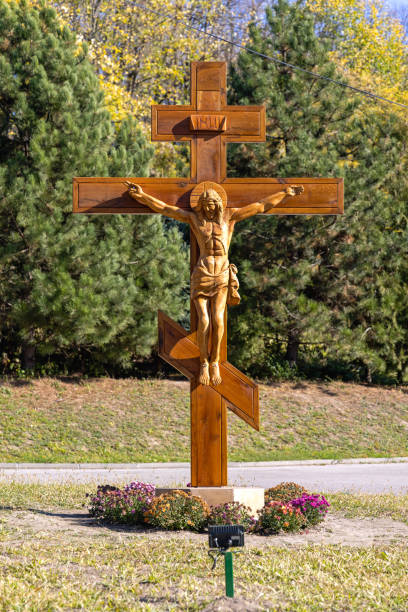 Bavaniste, Serbia - October 31, 2021: Jesus Christ Crucifixion Wooden Cross in Front of Bavaniste Monastery Vojvodina.