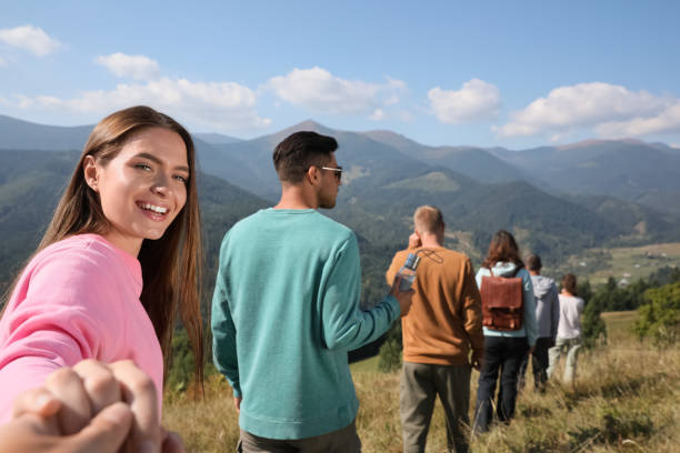 Group of people spending time together in mountains