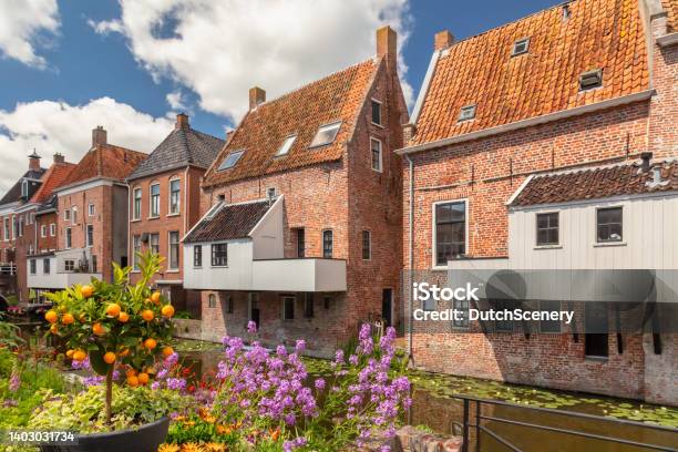 Dutch Medieval Houses With Hanging Kitches At The Damsterdiep Canal In Appingedam Groningen The Netherlands Stock Photo - Download Image Now