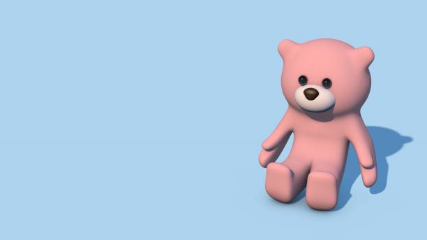 istock A pink soft rubber bear sits on a blue background, with space for text. 1403034358