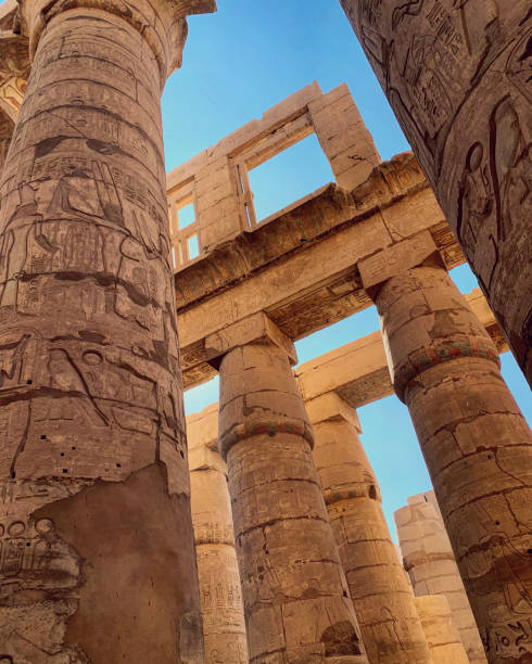 istock Temple columns covered in hieroglyphs in Karnak Temple, Luxor 1403034773