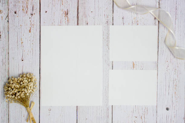 istock White notes with nature flowers over the wooden background. 1403035761