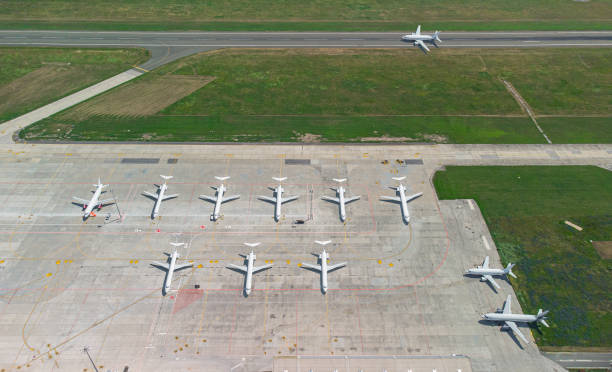 istock Airport with airplanes, aerial view 1403036370
