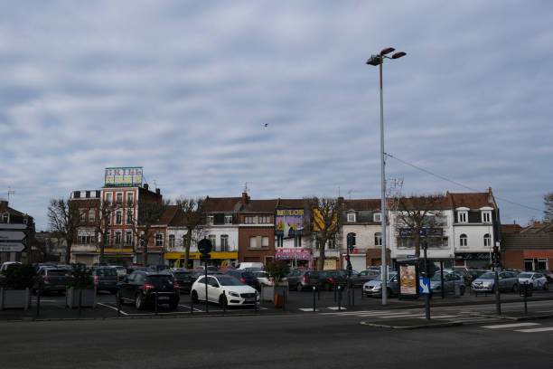 Cars parked seen in streets of Lens, France Cars parked seen in streets of Lens, France on Feb. 1, 2021. lens pas de calais stock pictures, royalty-free photos & images