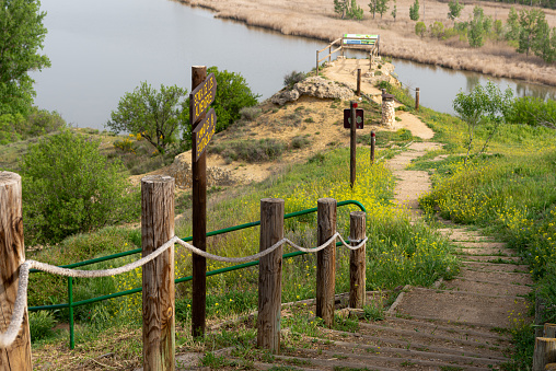 In the Duero Natural Reserve, Castronuño. The beginning of a hiking route starts with a stairway descent in the natural terrain, heading to a viewpoint overlooking the Duero River.