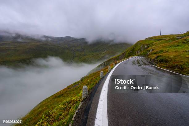 Cloudy And Rainy Day In Furka Pass In Switzerland Stock Photo - Download Image Now - Furka Pass, Beauty In Nature, Cloud - Sky
