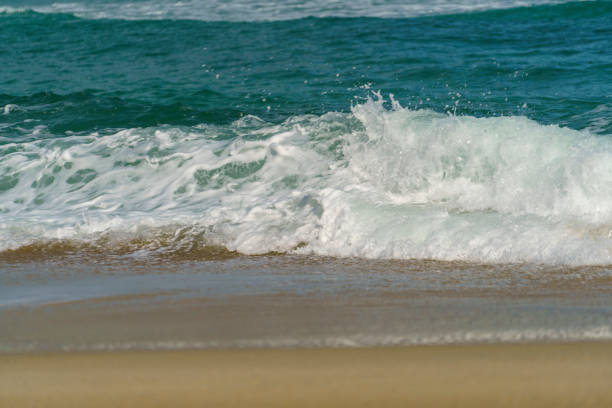 istock Seascape with waves on the beach 1403039384