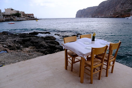 View of empty restaurant in the East Mani, Greece on August 27, 2021.