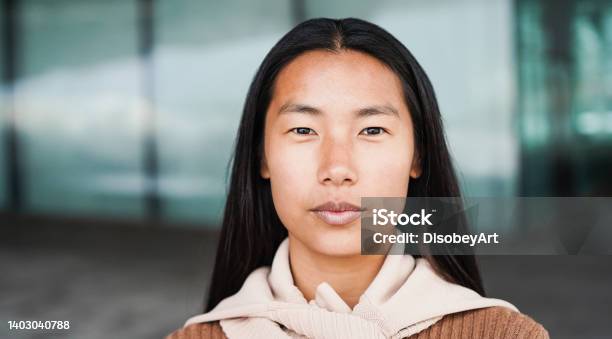 Portrait Of Asian Girl Looking At Camera Outdoor Focus On Face Stock Photo - Download Image Now