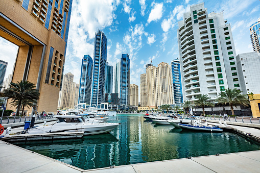 Dubai marina skyline in UAE. High-rise residential buildings, business skyscrapers