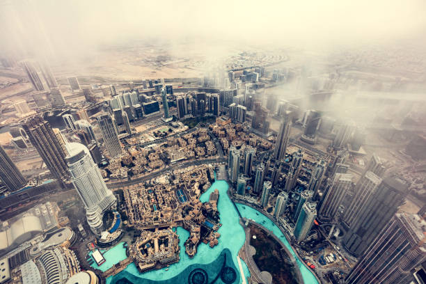 Dubai, UAE - March 30, 2015:  The Burj Khalifa, tallest building in the world. Aerial view of Downtown Dubai with man made skyscrapers from the tallest building in the world, Burj Khalifa, at 828m