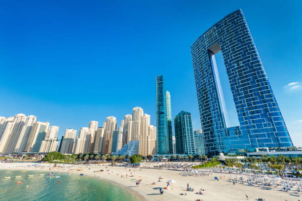 Dubai jumeirah beach with marina skyscrapers in UAE stock photo