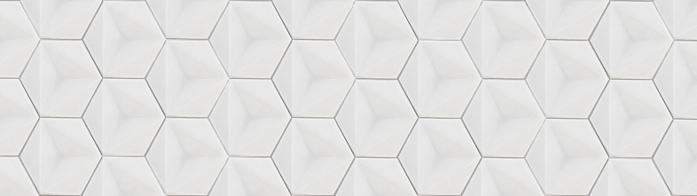 Abstract white seamless cement ceramic porcelain stone mosaic 3D tiles, tile mirror wall made of hexagonal geometric hexagon motif print texture background banner panorama