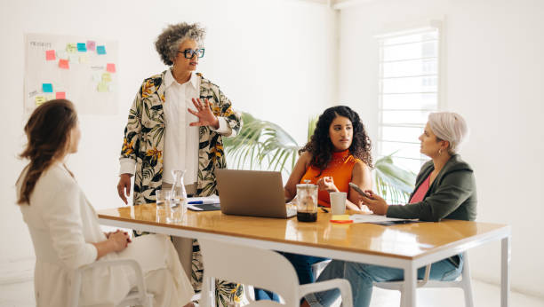 istock Diverse businesswomen having a discussion in a boardroom 1403049779
