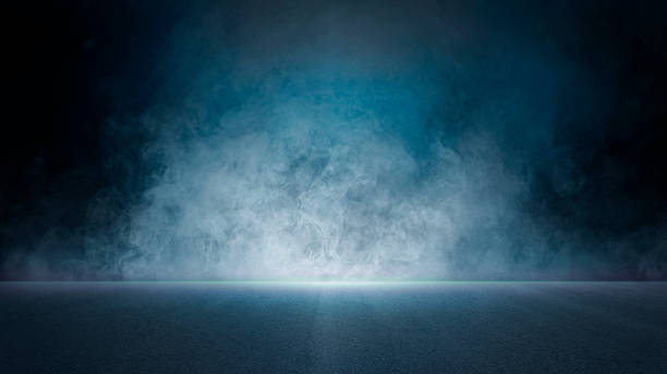 istock The dark stage shows, empty dark blue scene background, neon light, and spotlights The asphalt floor and studio room with smoke float up the interior texture for display products. 1403054441