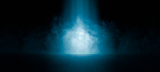 istock The dark stage shows, empty dark blue scene background, neon light, and spotlights The asphalt floor and studio room with smoke float up the interior texture for display products. 1403054537