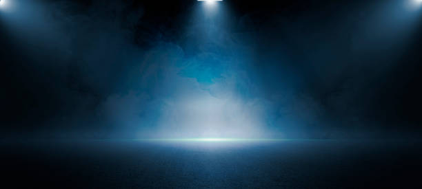istock The dark stage shows, dark blue  background, an empty dark scene, neon light, spotlights The asphalt floor and studio room with smoke float up the interior texture for display products 1403054684