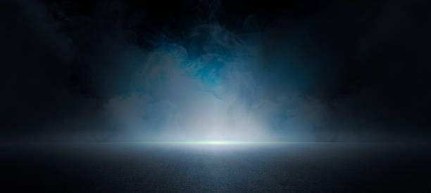istock The dark stage shows, dark blue  background, an empty dark scene, neon light, spotlights The asphalt floor and studio room with smoke float up the interior texture for display products 1403054685