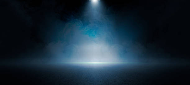 istock The dark stage shows, dark blue  background, an empty dark scene, neon light, spotlights The asphalt floor and studio room with smoke float up the interior texture for display products 1403054687