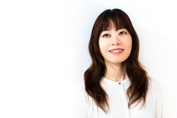 istock Young female employee (white background) 1403063698