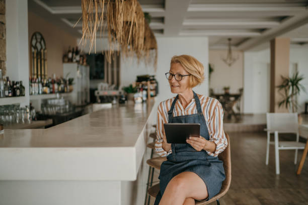 istock Woman works in cafe 1403065026