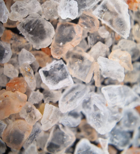 istock Macro Microscopic view of pink salt crystals 1403069551