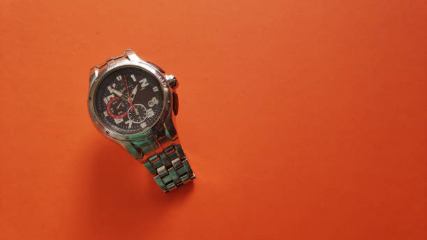 istock luxury watch isolated on a colored background 1403071437