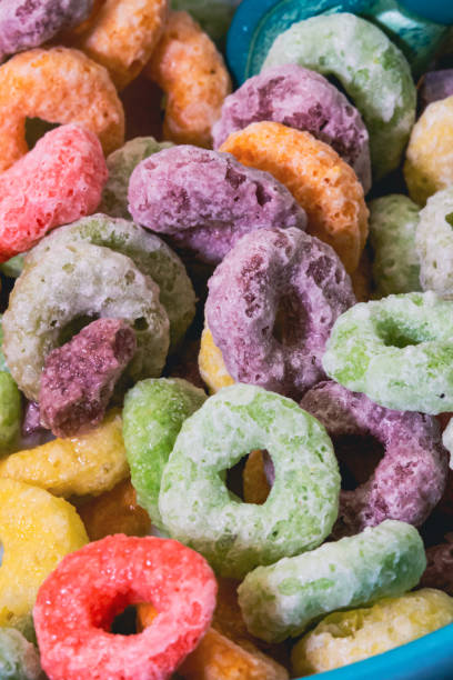 istock Colorful sugar cornflakes. Breakfast cereal. Closeup cereal food. 1403071573