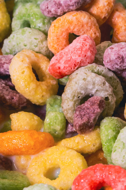 istock Colorful sugar cornflakes. Breakfast cereal. Closeup cereal food. 1403071575