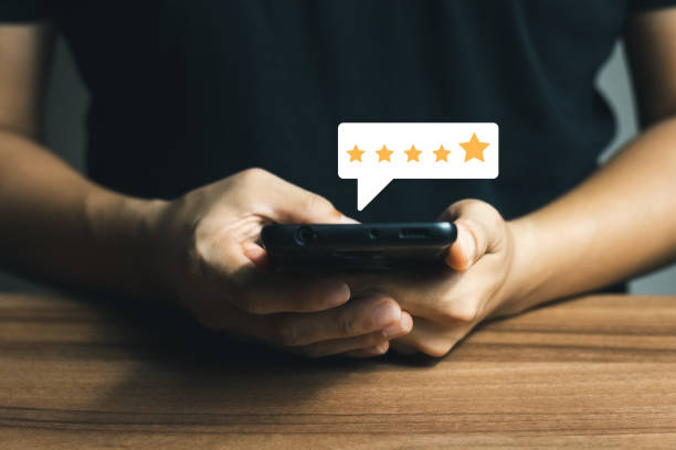 istock User give rating to service experience on online application, Customer review satisfaction feedback survey concept. 1403072540