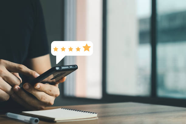 istock User give rating to service experience on online application, Customer review satisfaction feedback survey concept. 1403072639