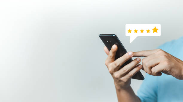 istock User give rating to service experience on online application, Customer review satisfaction feedback survey concept. 1403072933