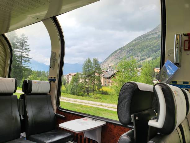 scenic view from wide window of bernina express in switzerland. - bernina express imagens e fotografias de stock