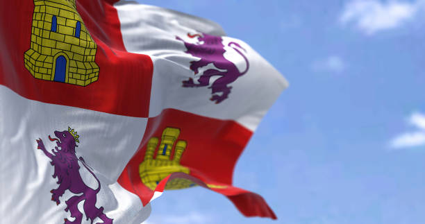 istock The Castile and Leon flag waving in the wind on a clear day 1403076828