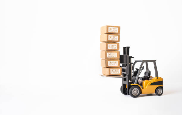 istock Industry and business transportation with forklift loading product box.economy with demand and supply concepts. 1403078814