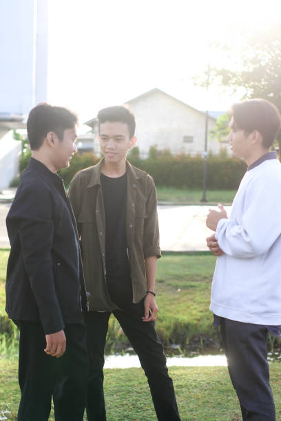 istock group men talking at city park 1403080156