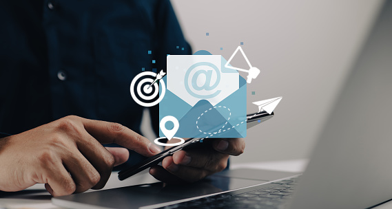 The concept of email marketing. advertising medium, customers to target, messages to deliver, invitations to send, message notifications, enticing offers.